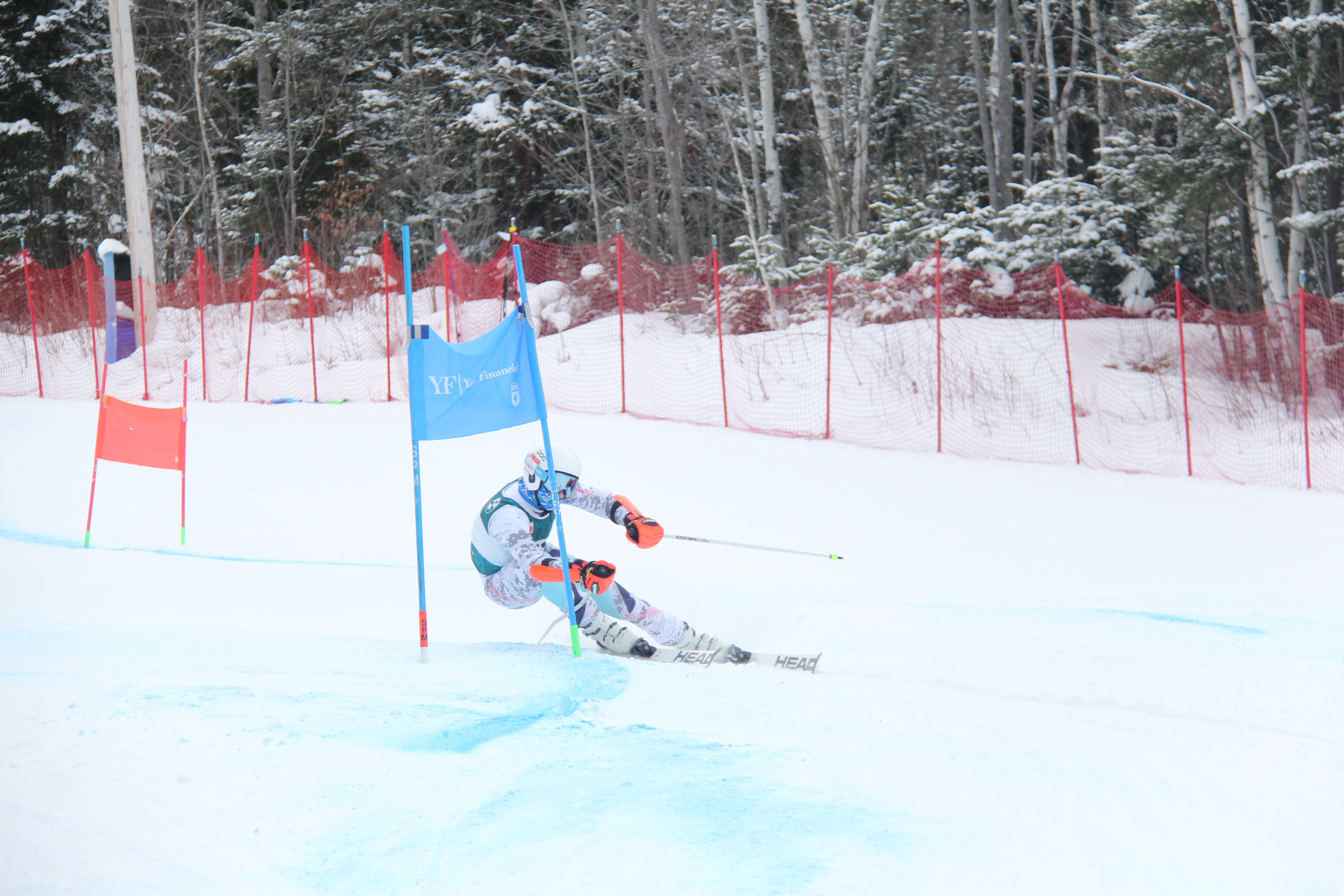 Ski NB athlete carving through a course