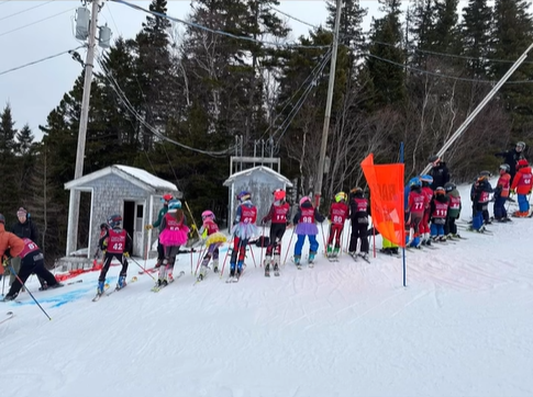 Young Ski NB athletes lined up at a fun event