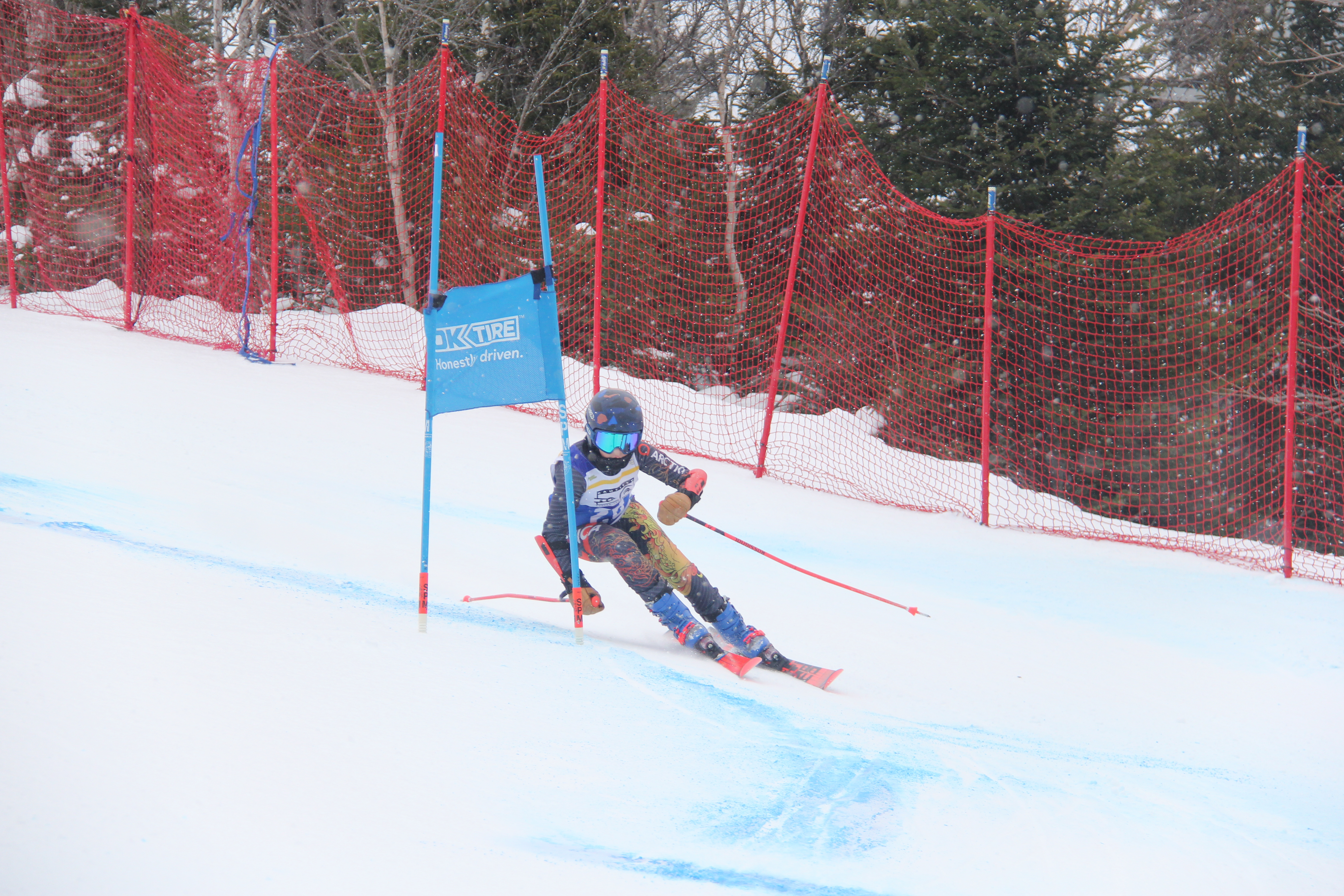Ski NB athlete racing on course