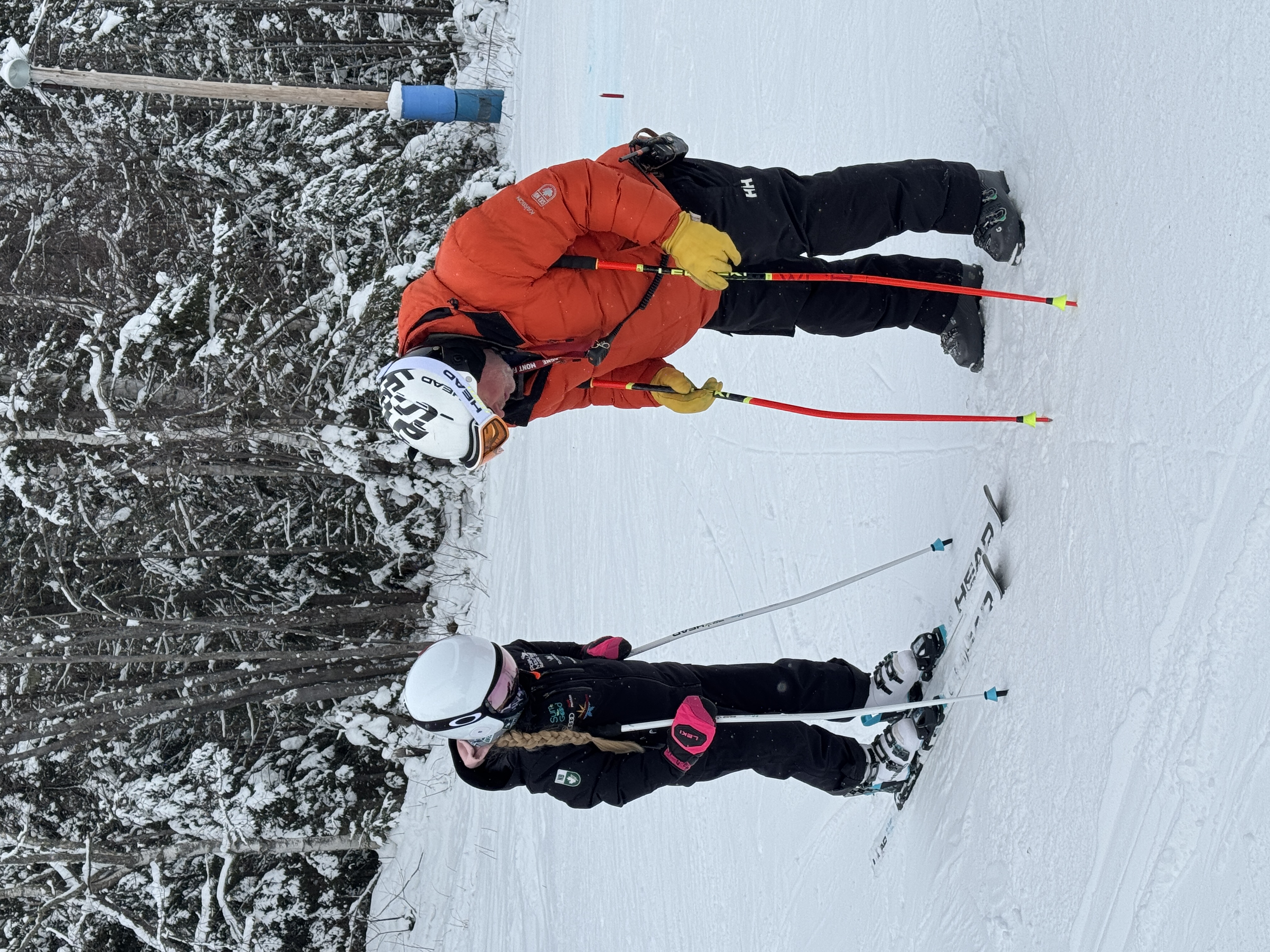 Ski NB coach working with athletes