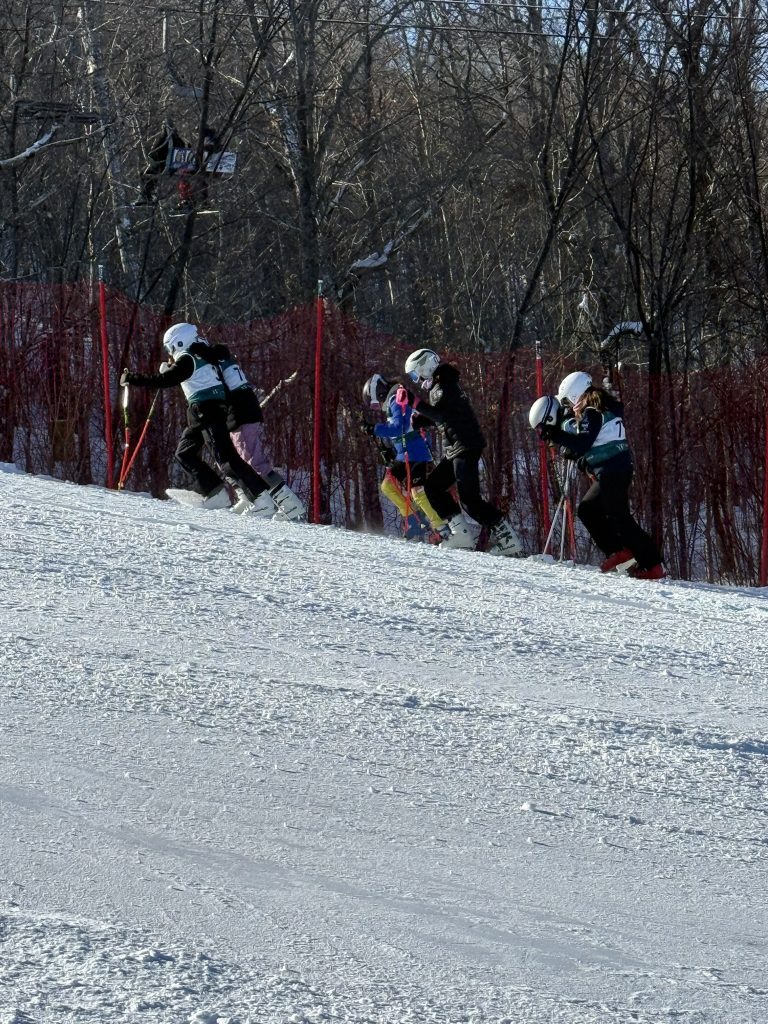 Ski NB athletes walking on snow