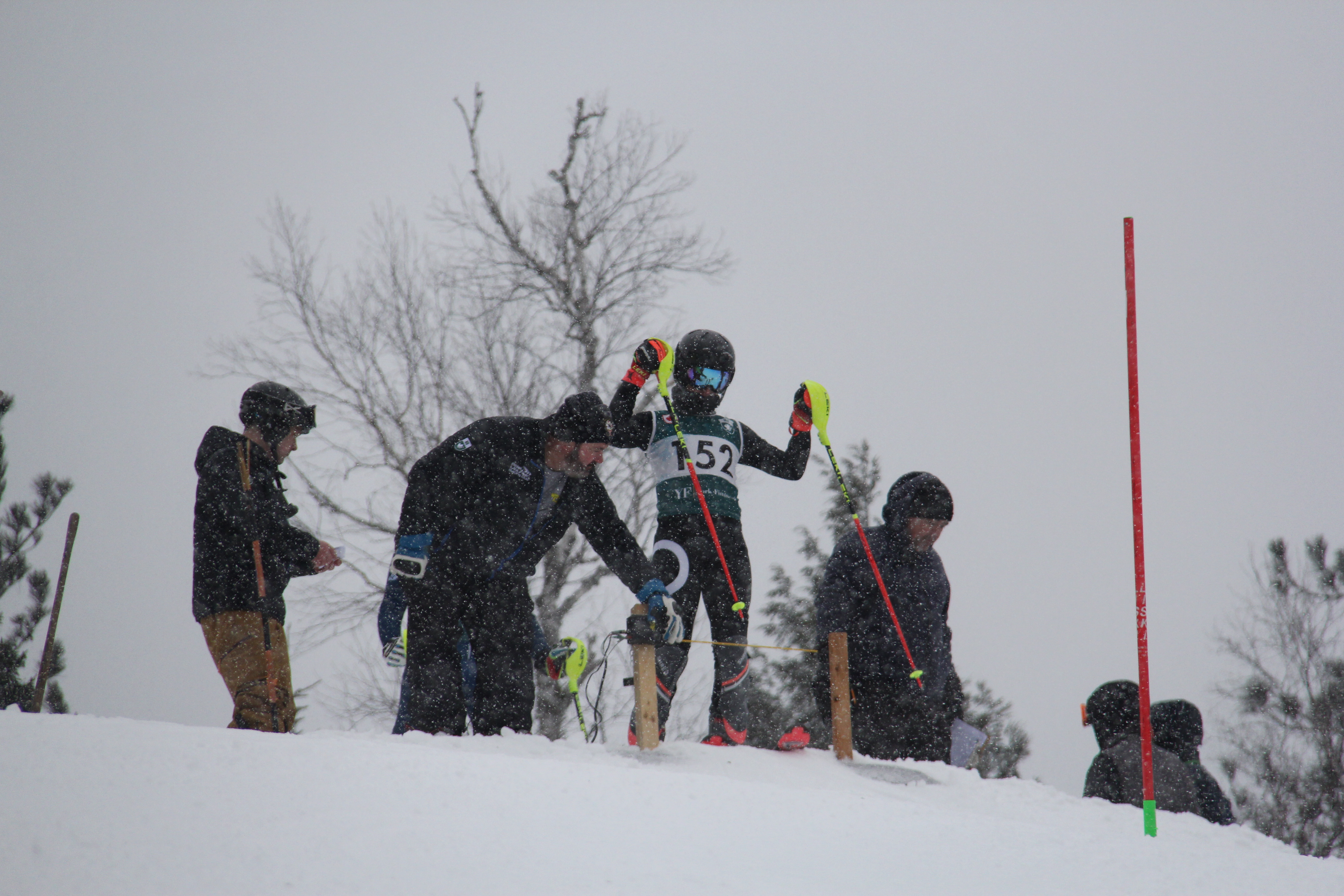 Ski race officials on course