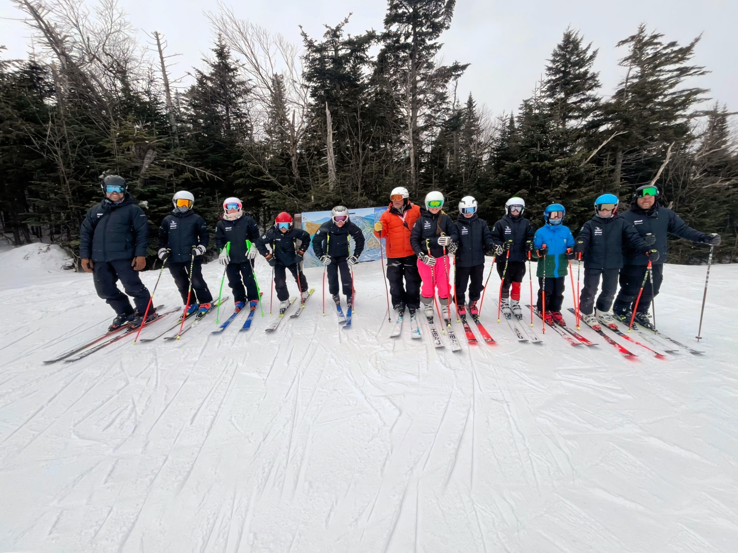 Ski Team NB athletes gathered on snow