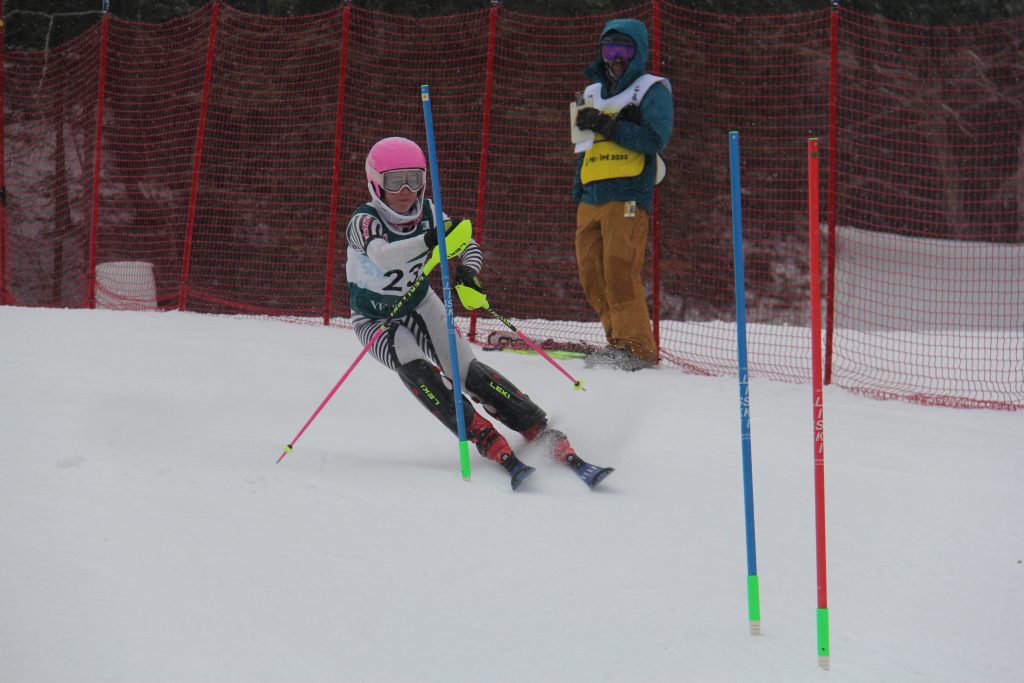 Race official monitoring an athlete on course