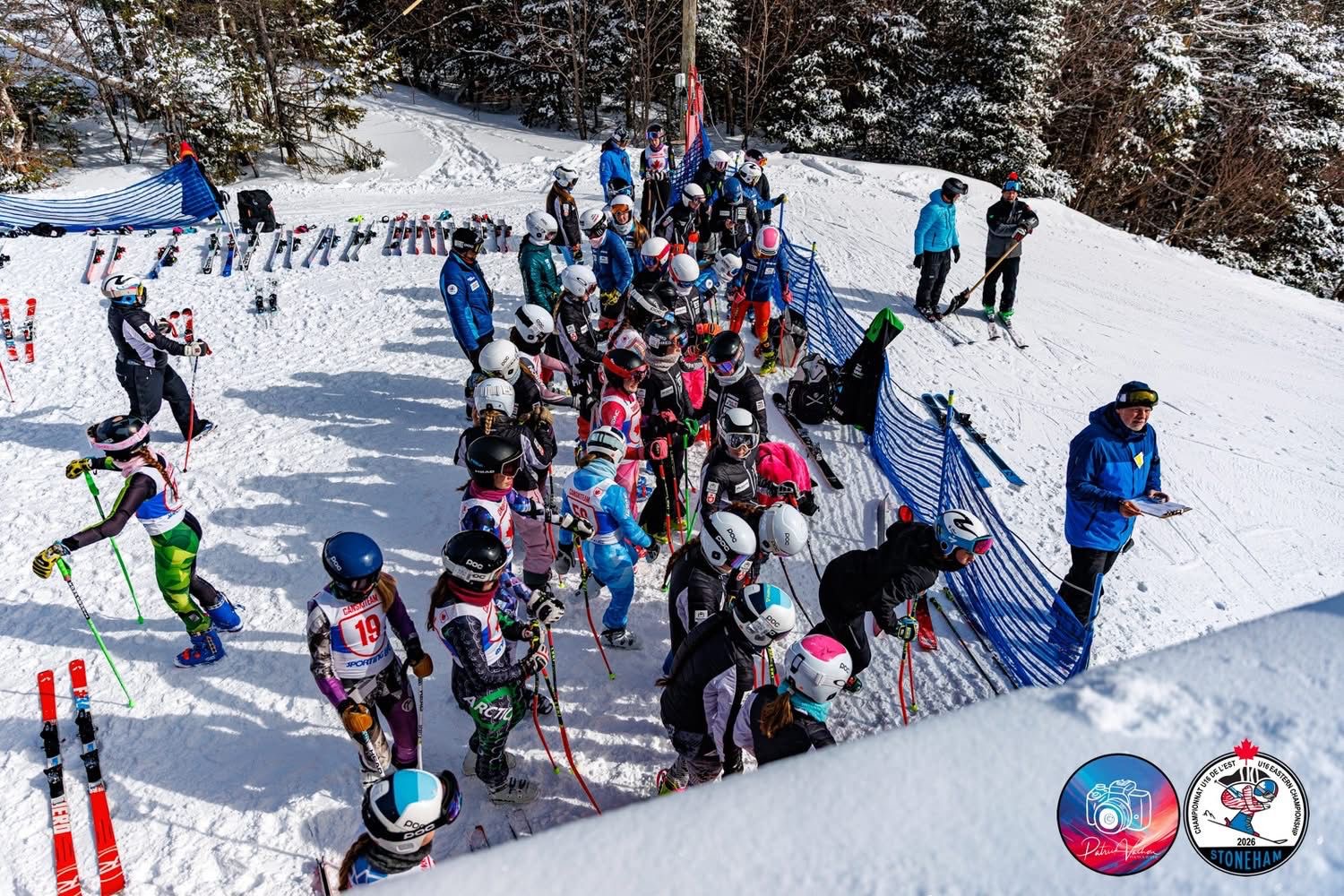 Group of ski racers getting ready at the start area