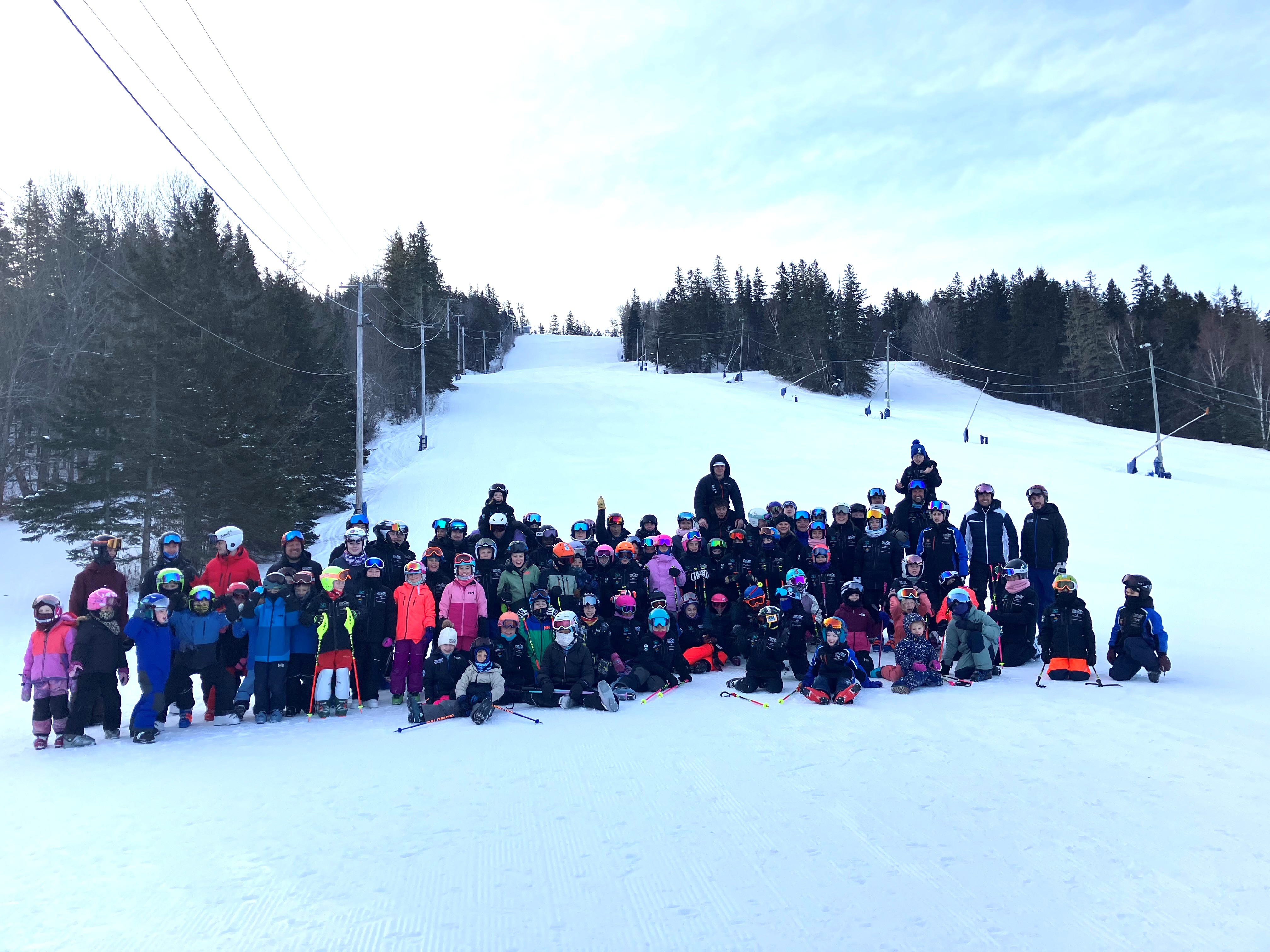 Poley Mountain Race Club athletes and coaches gathered on snow